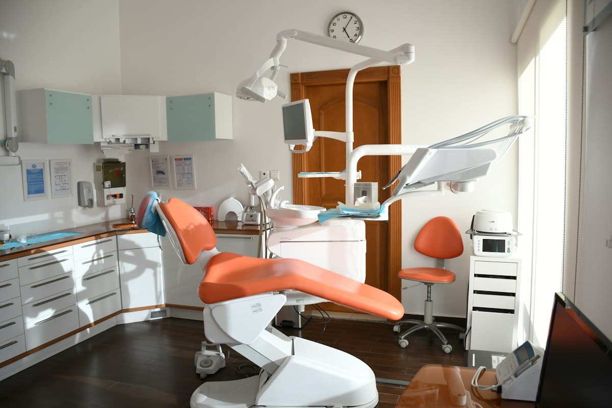Dentist explaining modern comfortable denture options to a patient